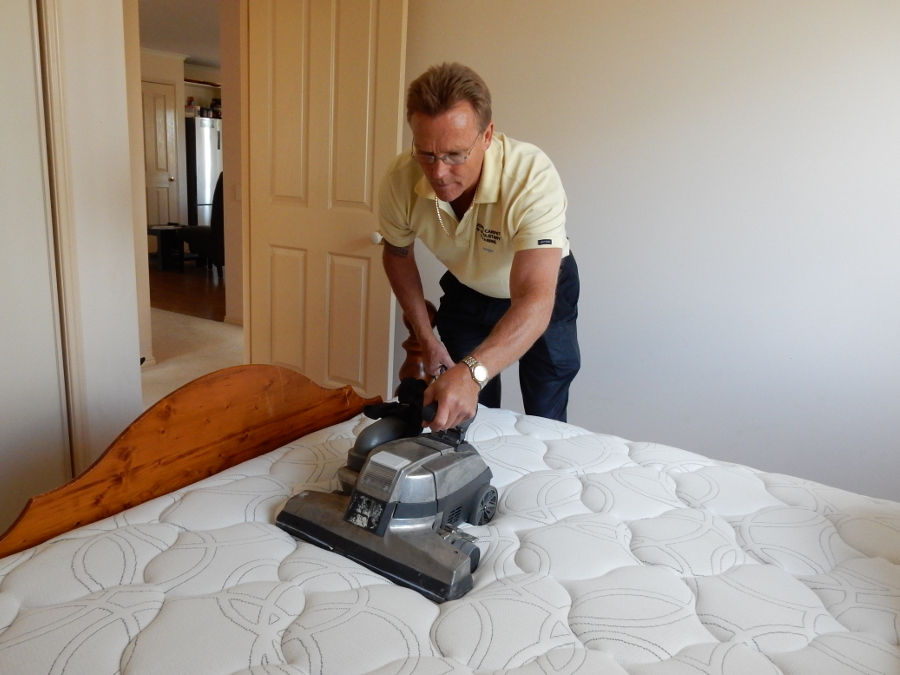 John dry cleaning a mattress.